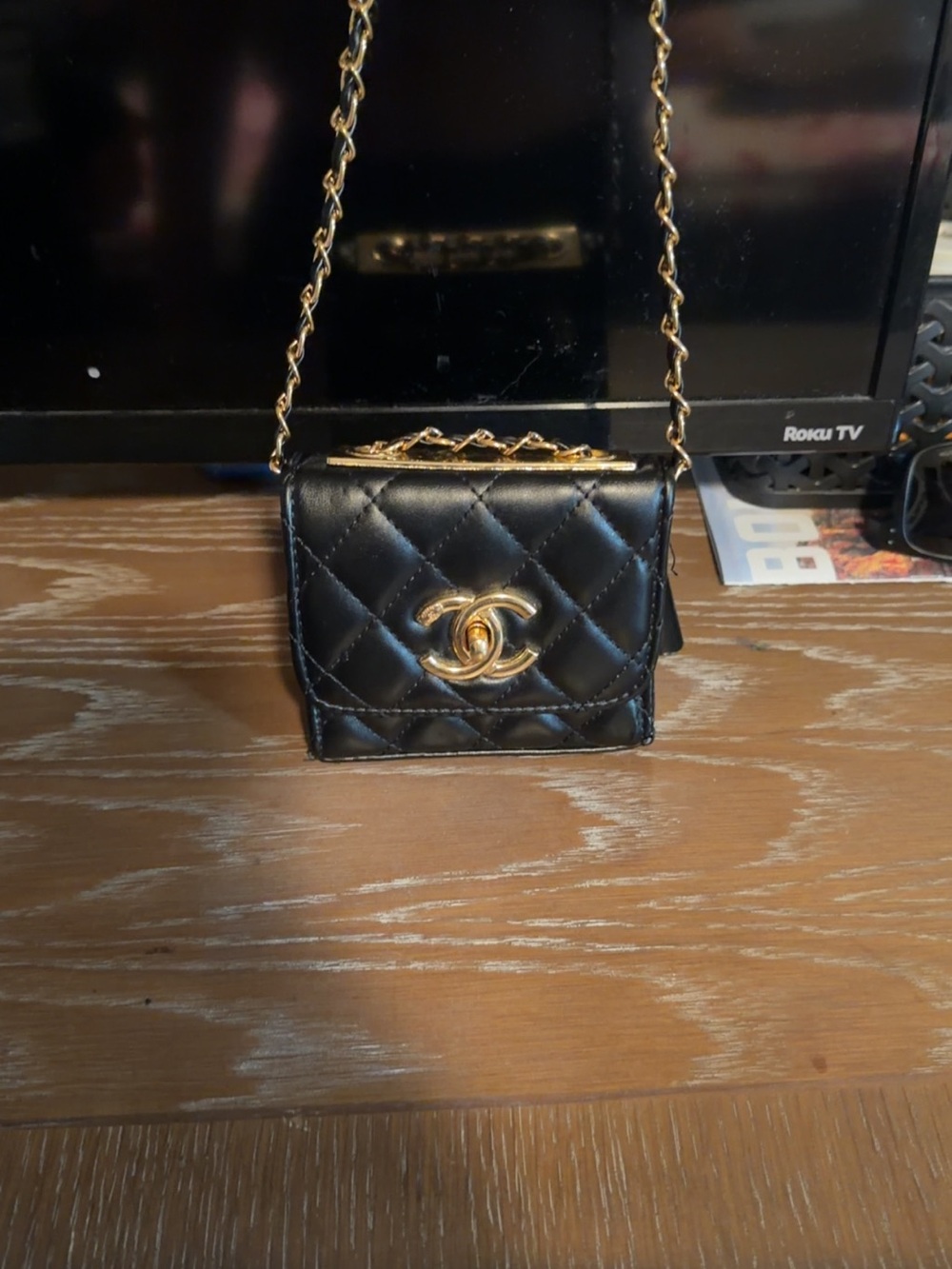 CHANEL Black Quilted Mini Crossbody with Gold CC Hardware
